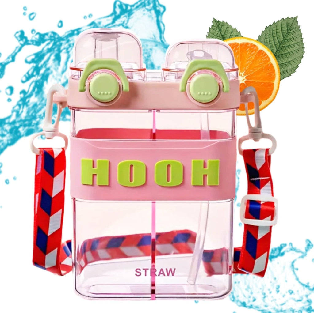 HOOH Kids Dual-Chamber Water Bottle green with crossbody strap on grass