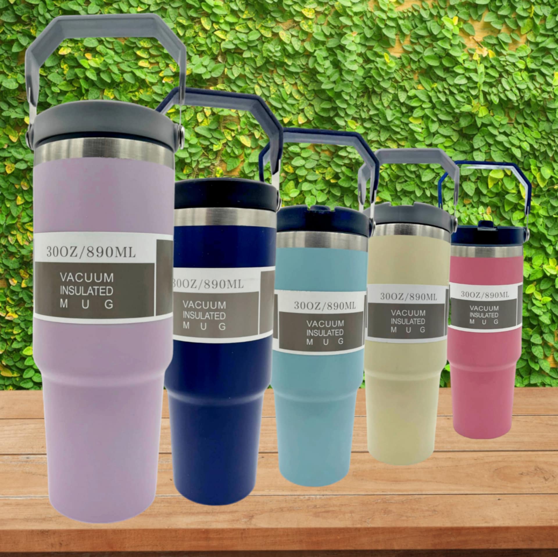 30oz Vacuum Insulated Mug beige close-up — carry handle detail and 18/8 stainless steel badge
